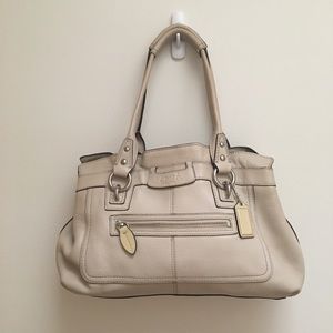 Nude Coach purse with ruffled edges